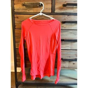 Lululemon long sleeve run shirt. Size 6 in tomato red. Excellent condition!!